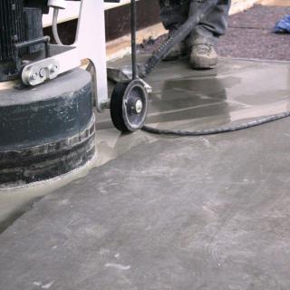 Grinding and polishing of reinforced concrete